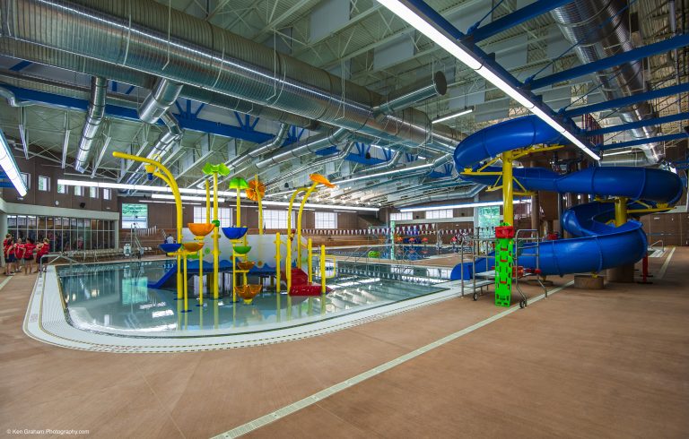 Water slides and water play place in indoor pool