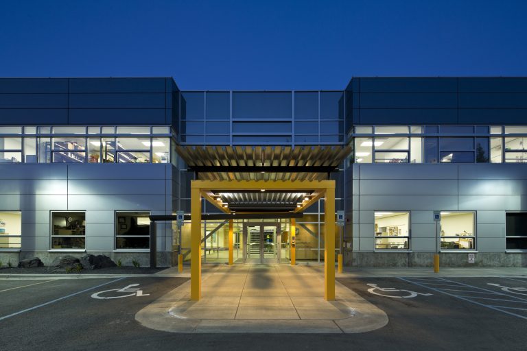 Multistory building with gray tiled walls