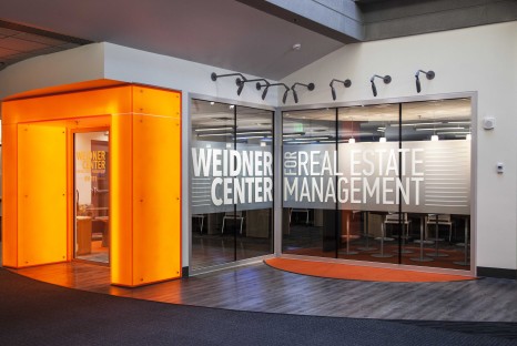 Bright orange entryway to room
