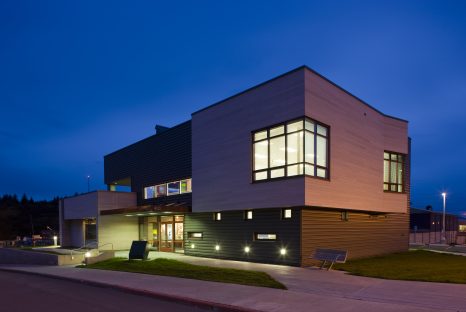 Building with wood and metal paneled walls